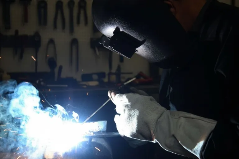Welder working on a metal fabrication